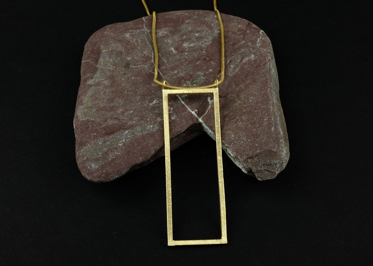 Grand geometric pendant